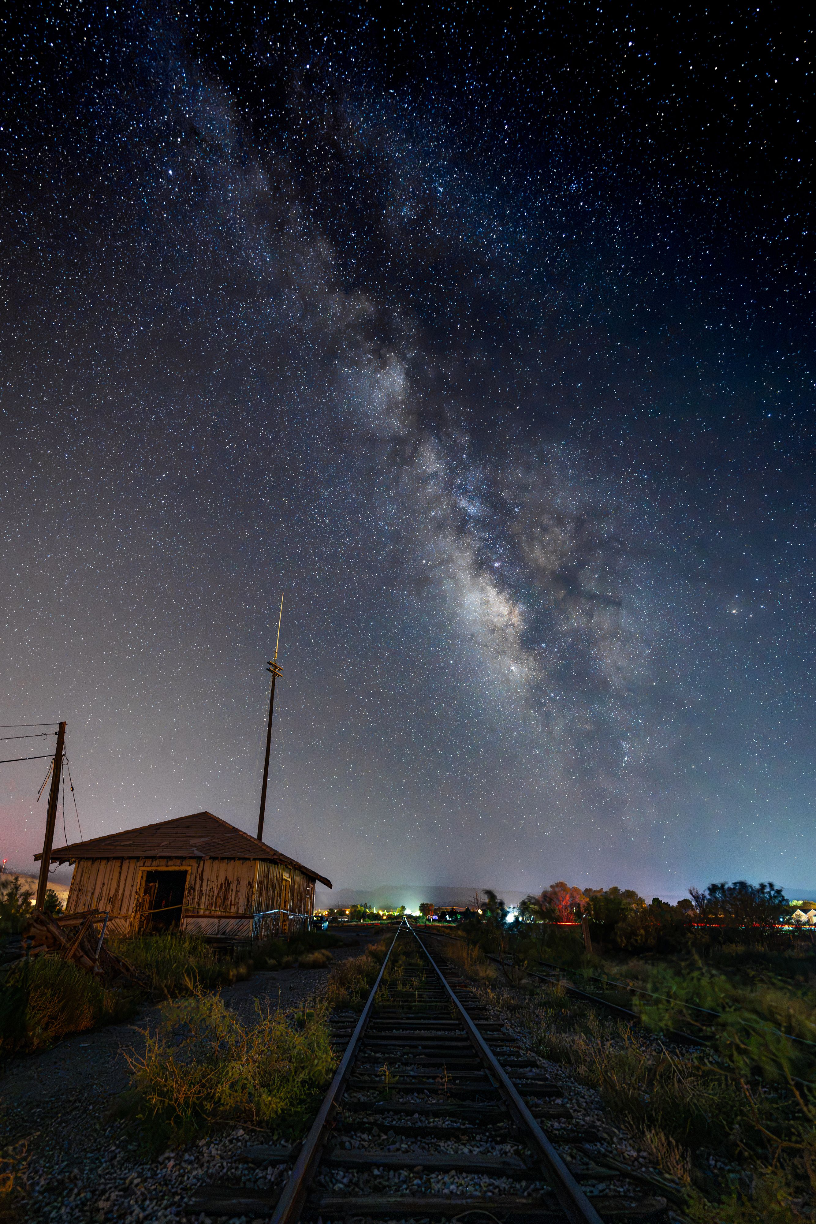 The Milky Way over an abandoned train depot in Alpine Texas.